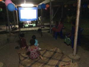 Watching movies under the house. 