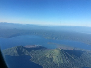 Seeing the volcanoes from the plane. The one I climbed is the biggest on the right. 